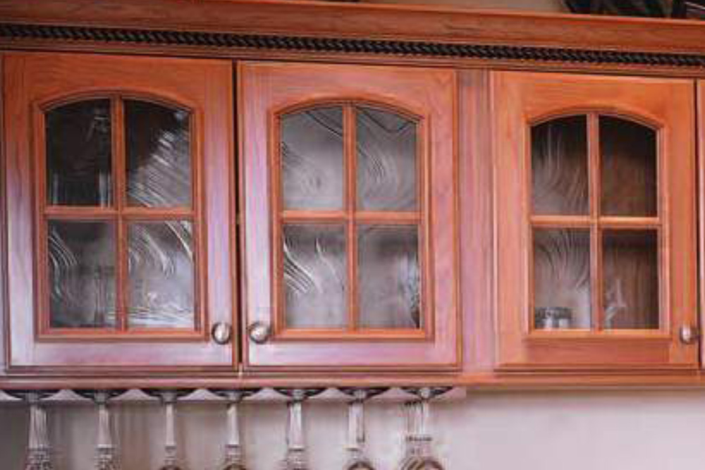 Kitchen cabinets refinished in the home